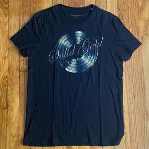 JOHN VARVATOS “Solid Gold Vinyl” 2-sided t-shirt.